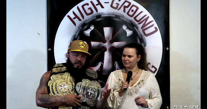 Lucius Krow shows off his Championship Title belts.