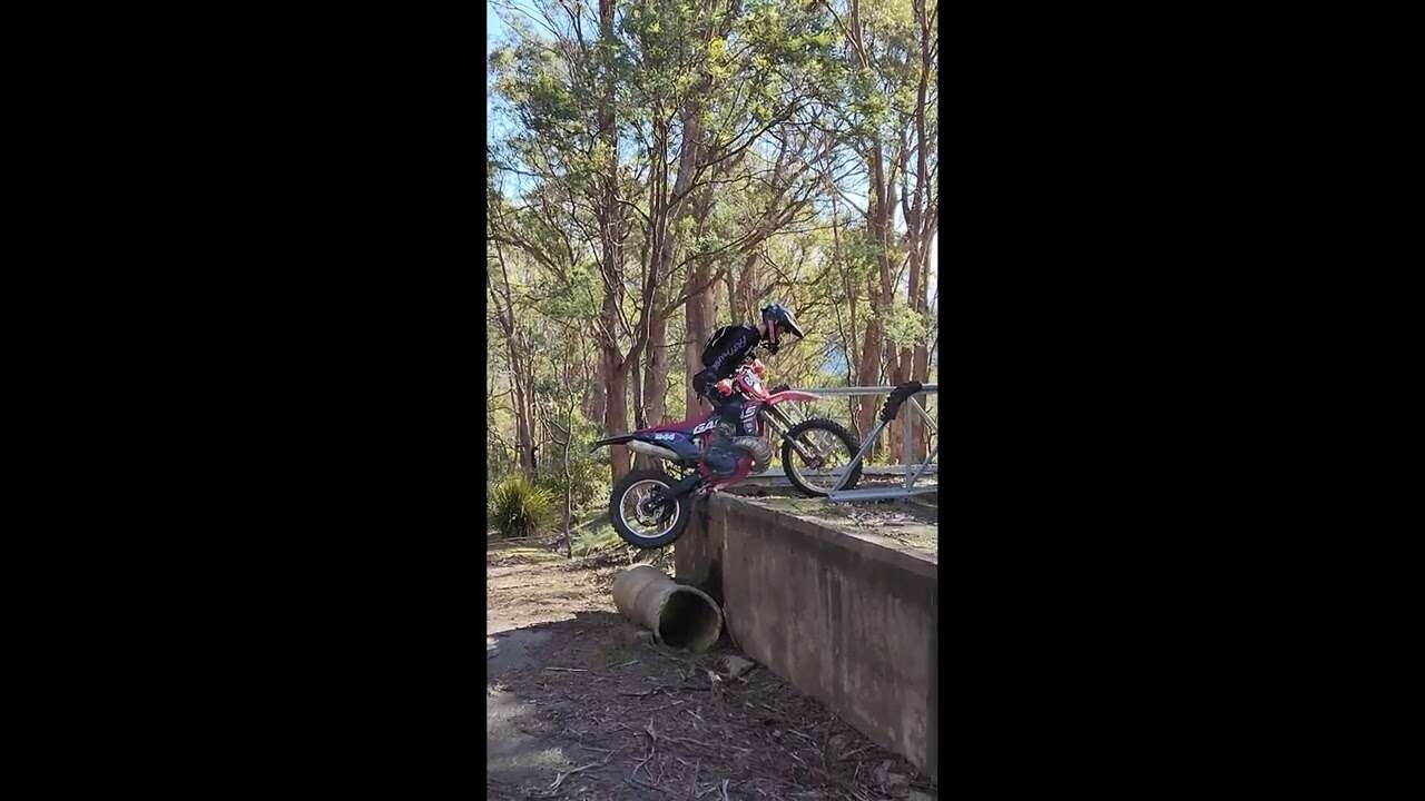 Conquering A Concrete Wall On A Dirt bike
