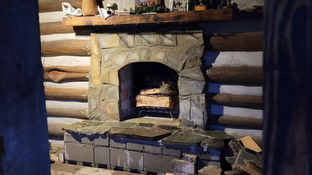 Off-grid tiny cabin fireplace looks like something from the Hobbit update #39